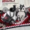 Advertisement for Arlene's Gallery in Tombstone, Arizona with red, white and black theme