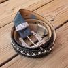 Leather belt on boardwalk