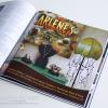 In magazine advertisement for Arlene's Gallery in Tombstone, Arizona with green lamp and table