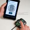 Product shot for Opus of hands with inspection tool