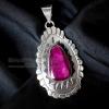 Silver pendant on black satin