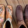 Bird's eye view of leather cowboy boots on boardwalk 